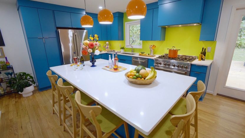 The white countertops give visual relief.