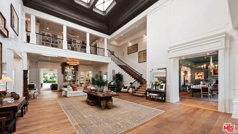 The mansion has a soaring double-story great room with elaborate skylights.