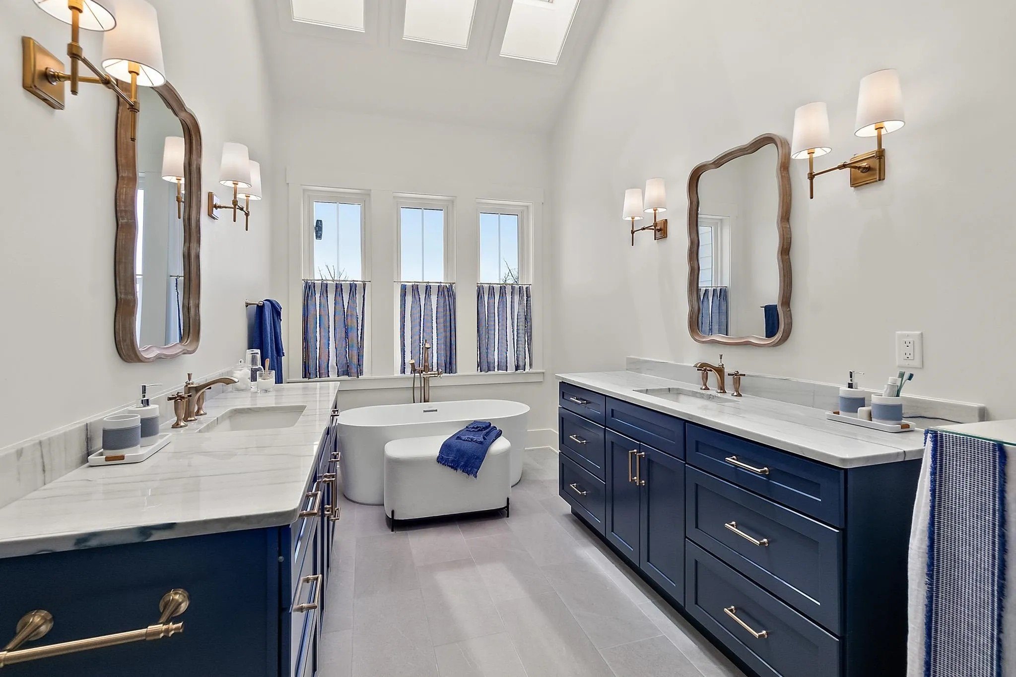 The primary bath has a relaxed, nautical feel.