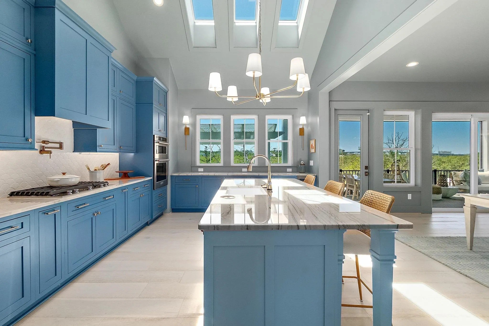 The kitchen, and the whole house, is illuminated by skylights.
