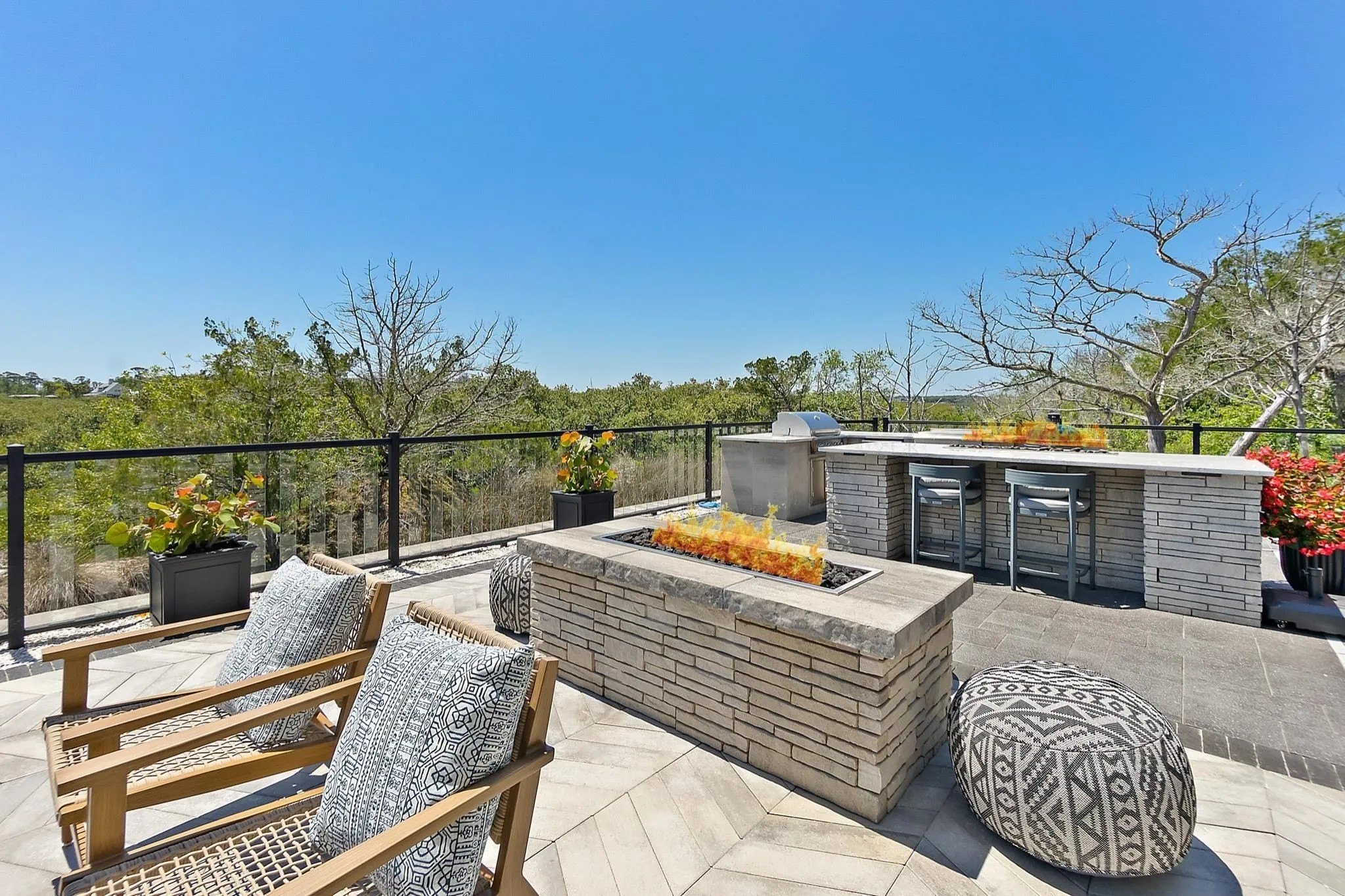 There's also an outdoor fire pit, bar and kitchen.