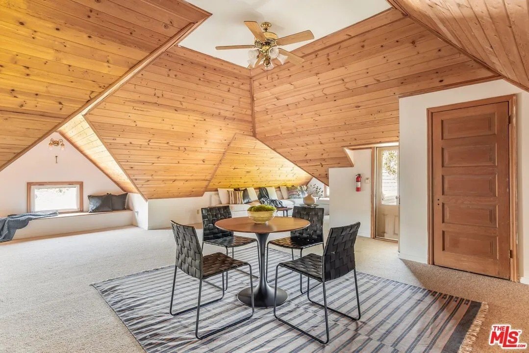 The large, finished attic includes additional square footage.