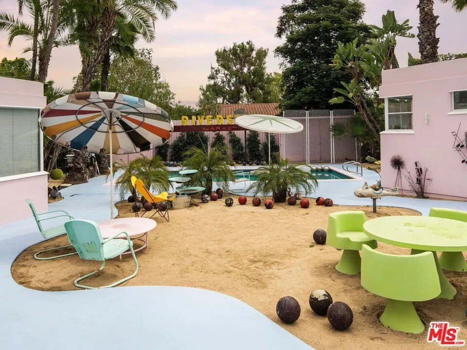 Bowling balls make a striking statement on the backyard beach.