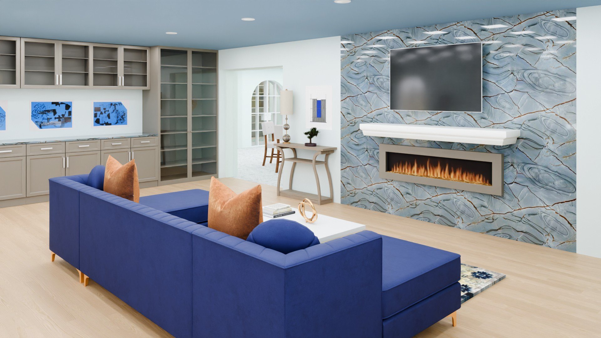 The blues and whites of the icy tundra can be seen in the deep blue quartz used on the living room fireplace and built-ins.