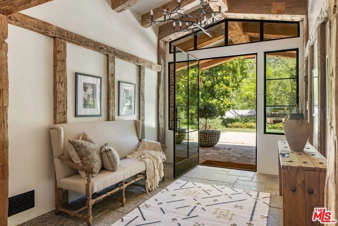 The three residences on the property, that contain more than 20,000 square feet of living space, have undergone recent designer renovations,