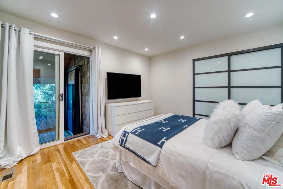 One of two main floor bedrooms that share a Jack-and-Jill bath