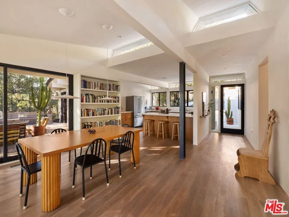 The classic mid-century modern interiors with modern updates survived the fire intact as well.
