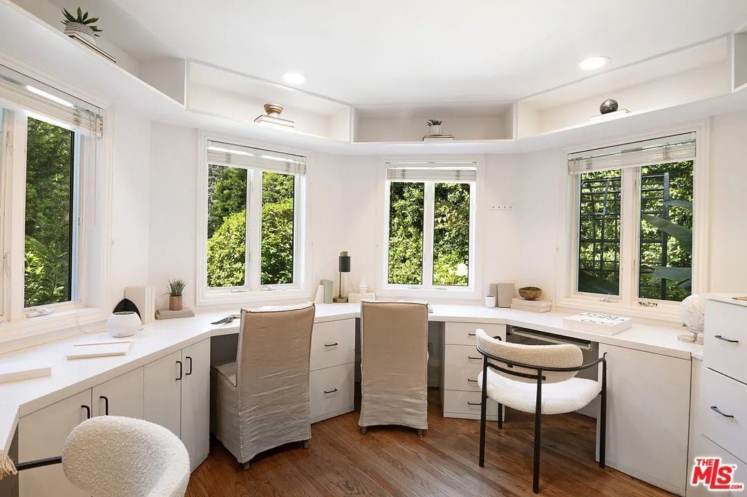 The turret office/homework room with built-in desks and cabinetry is a highlight.