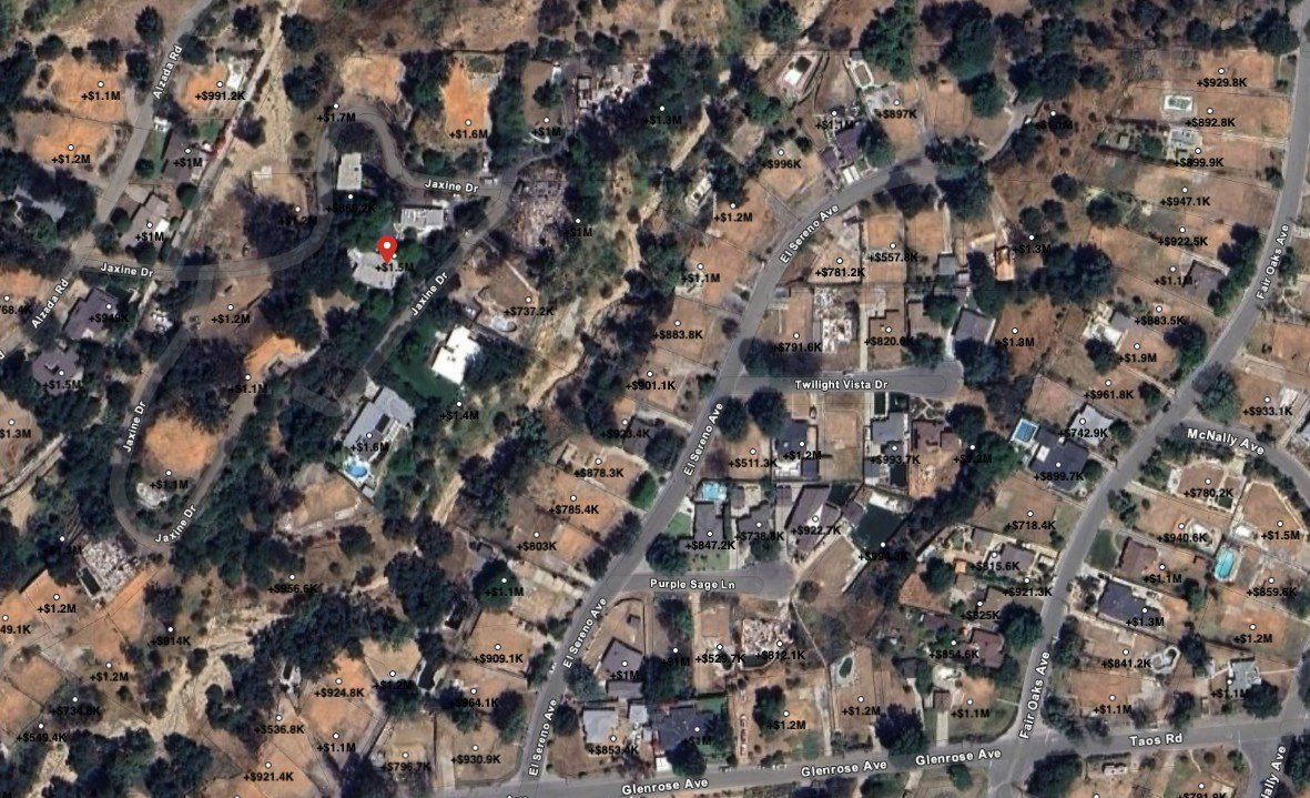 This recent satellite view from Google Maps shows how most of the other homes in the neighborhood were burned to the ground.